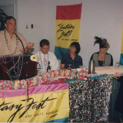 Unknown man speaking at the award ceremony.