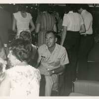 An unknown man in uniform at a party