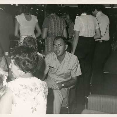 An unknown man in uniform at a party
