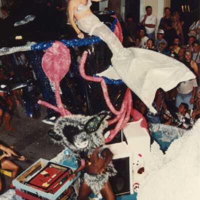 Unknown people on a float in the parade.