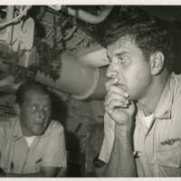 2 Men in uniform in a control room