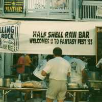 A sign that reads Half shell raw bar welcomes you to FF 93.