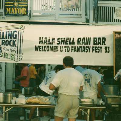A sign that reads Half shell raw bar welcomes you to FF 93.