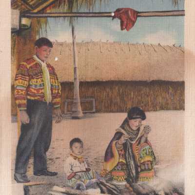 A Seminole Squaw Smoking Gar Fish