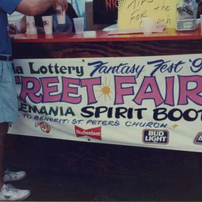 Florida lottery street fair sign and booth.