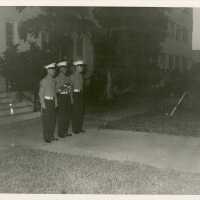 3 Unknown men in uniform