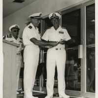 3 Men in uniform at a ceremony