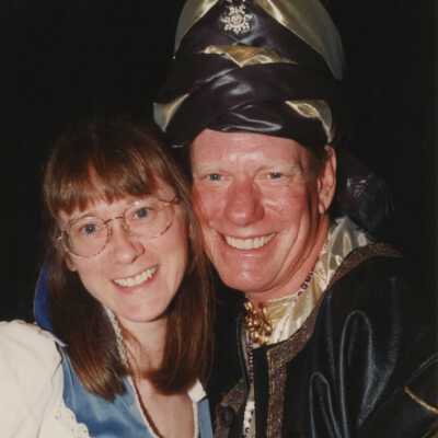 Unknown couple dressed up.