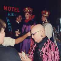 Fantasy Fest King and Queen in front of motel.