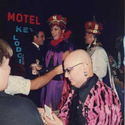 Fantasy Fest King and Queen in front of motel.