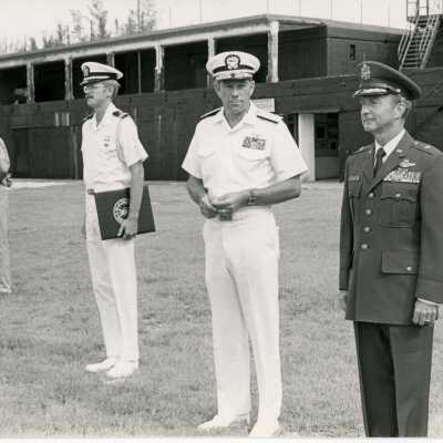 Unknown men in uniform standing outside