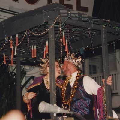 Fantasy Fest queen and king on a float.
