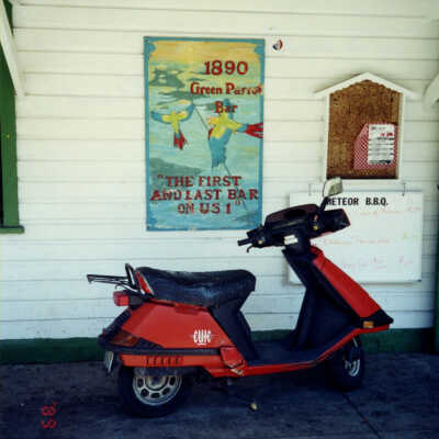 Red Scooter at the Green Parrot Bar