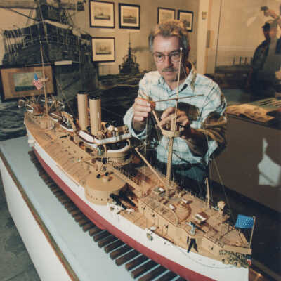 Joe Pais with the U.S.S. MAINE Model