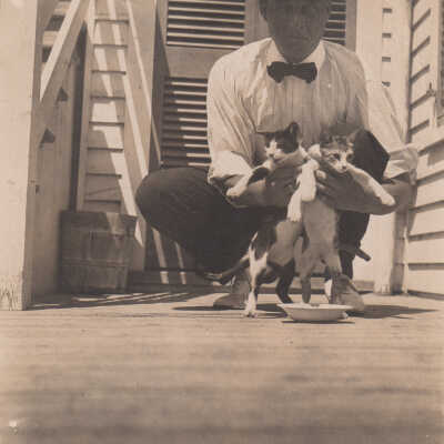 Father Hilliard with Two Kittens