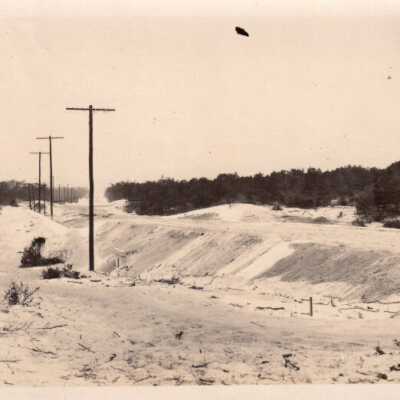 Sand dune and telephone poles: Copyright: © Key West Art & Historical Society; Origformat: Print-Photographic