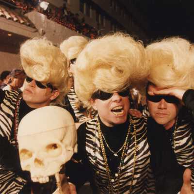 Unknown people dressed up.