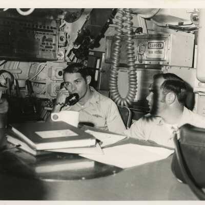 U.S. Navy men in a control room