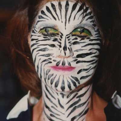 Unknown lady with her face painted.