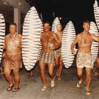 A group of unknown people dressed up.