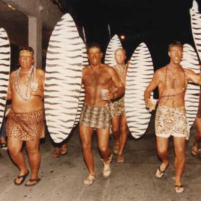 A group of unknown people dressed up.