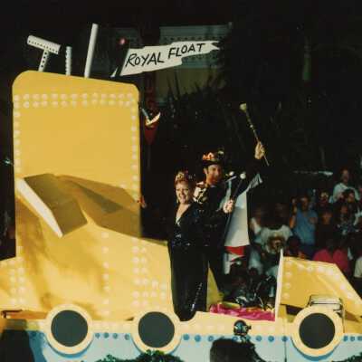 A float in the parade that reads Royal Float.