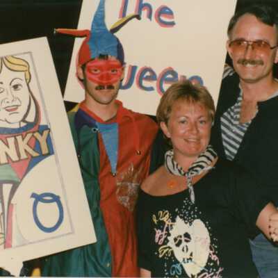 Unknown people dressed up.