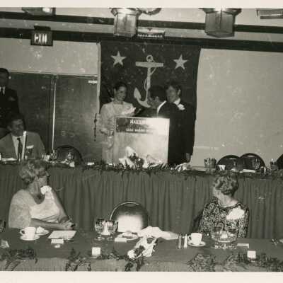 Unknown people at the podium during a ceremony