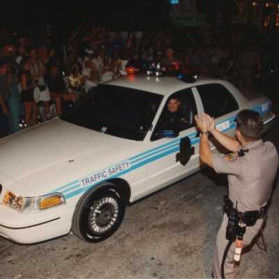 A cop car in the parade.