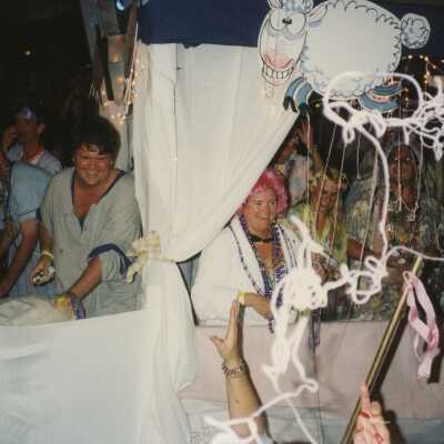 Unknown people on a float in the parade.