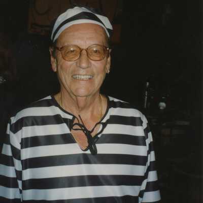 An unknown man dressed up.