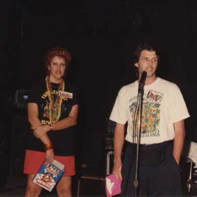 Unknown people on a stage.