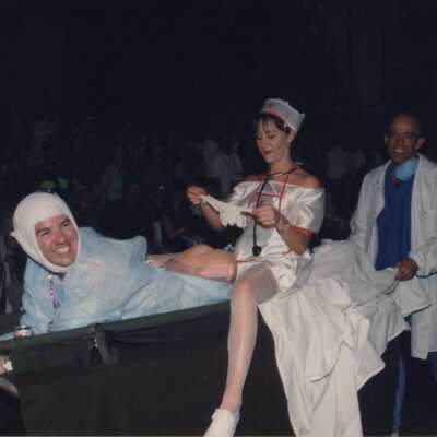 Unknown people dressed up on a float.