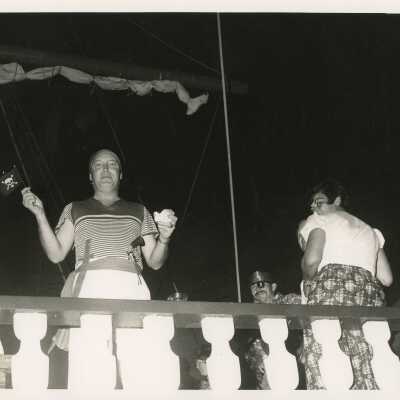 Unknown people dressed up at a get together