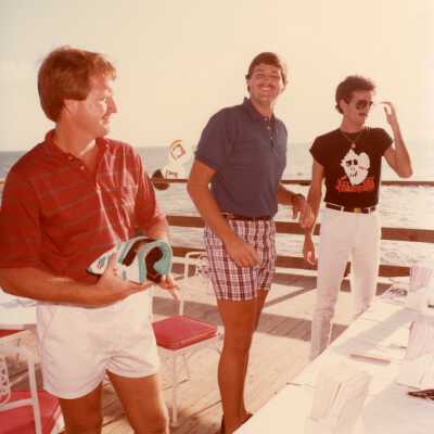 Three unknown men at some sort of FF party.