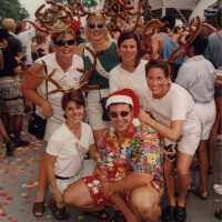 A group of unknown people dressed up.