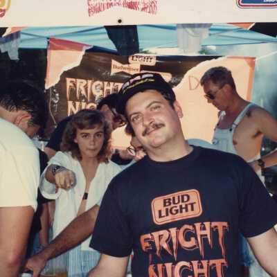 An unknown man at a booth.