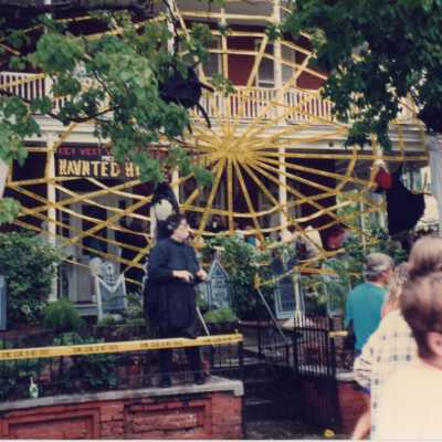 A huge web outside of the woman's club.