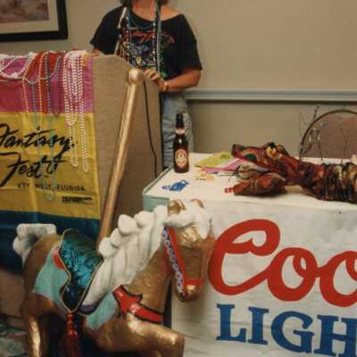 Unknown woman talking at the Coors light parade workshop.