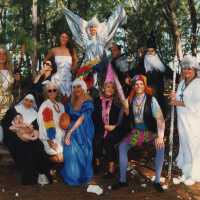 A group of unknown people dressed up.