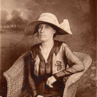 Woman seated in a chair