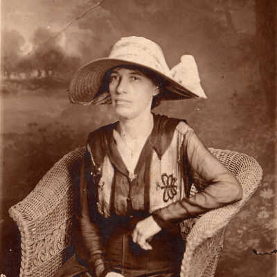 Woman seated in a chair