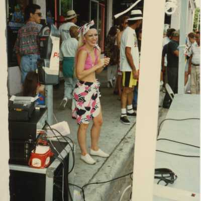 An unknown lady standing outside of CrazyDaizy'z.