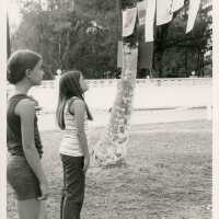 2 Unknown kids looking at artwork