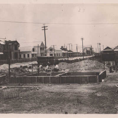 Unknown men on a building foundation