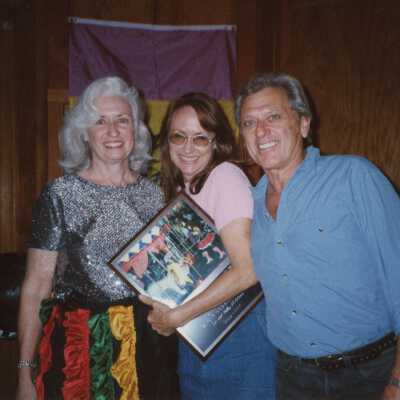 Unknown people at an award ceremony.