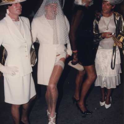 Unknown people dressed up.