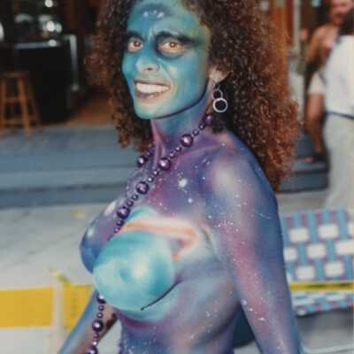 Unknown lady with her breast painted.