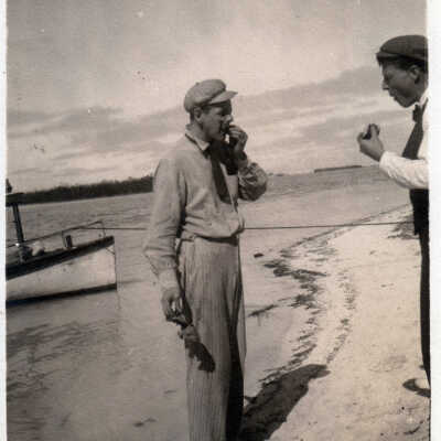 Men picnicing on the beach