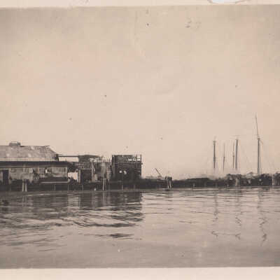 Unknown damaged building near the water